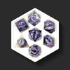 Amethyst Eye black and purple dragon eye dice set top view