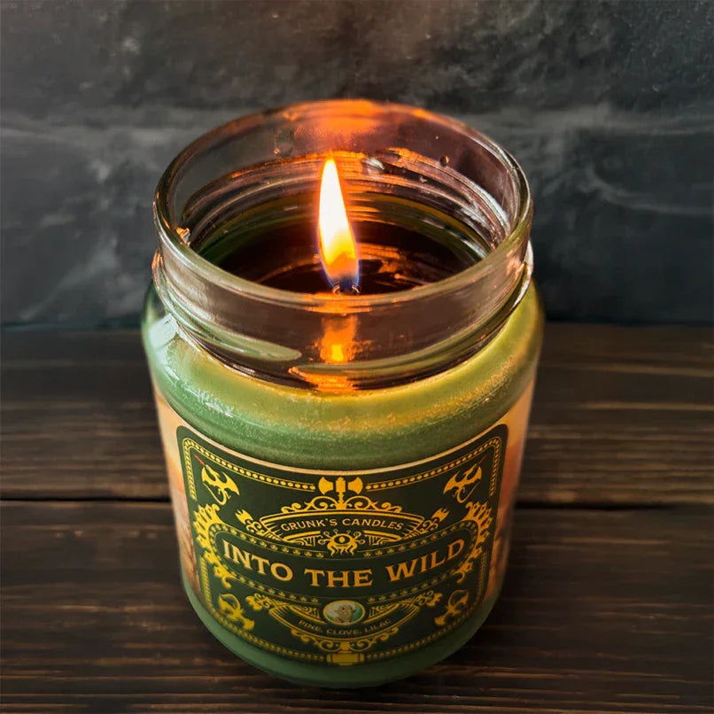Grunk's Candles Into the Wild burning candle